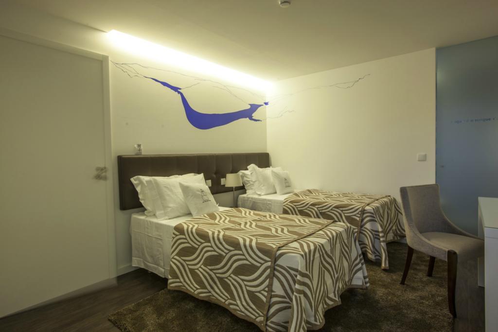 Casa Dona Maria Luiza Guest House ตอร์เฮ เด มองคอร์โว ห้อง รูปภาพ