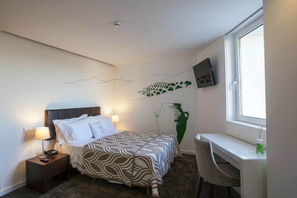 Casa Dona Maria Luiza Guest House ตอร์เฮ เด มองคอร์โว ห้อง รูปภาพ